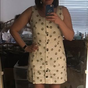 White ModCloth dress with green peace signs. Size 12.